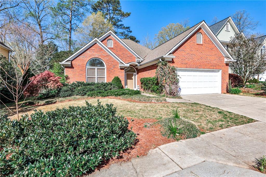 1446 Crescent Walk Decatur, GA 30033 - Photo 1 of 1 a front view of a house with garden