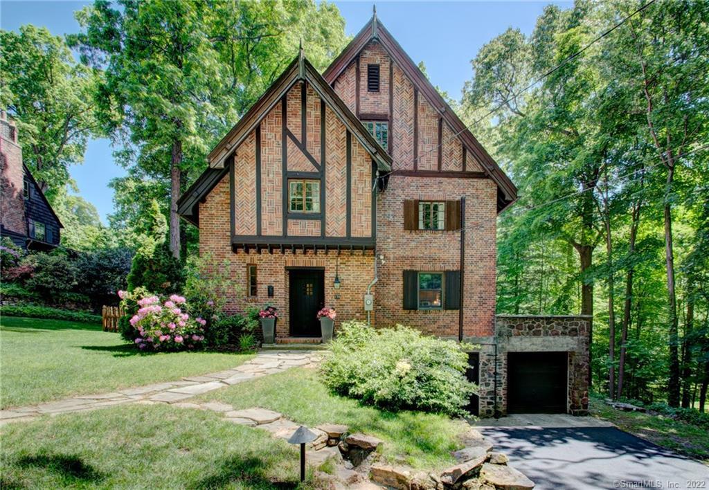 170 Brewster Road Bristol, CT 06010 - Photo 1 of 1 a front view of a house with garden