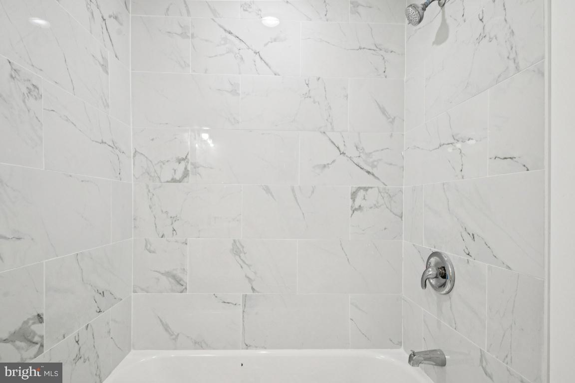 2330 Bryant Avenue Baltimore, MD 21217 - Photo 15 of 26 a bathroom with shower