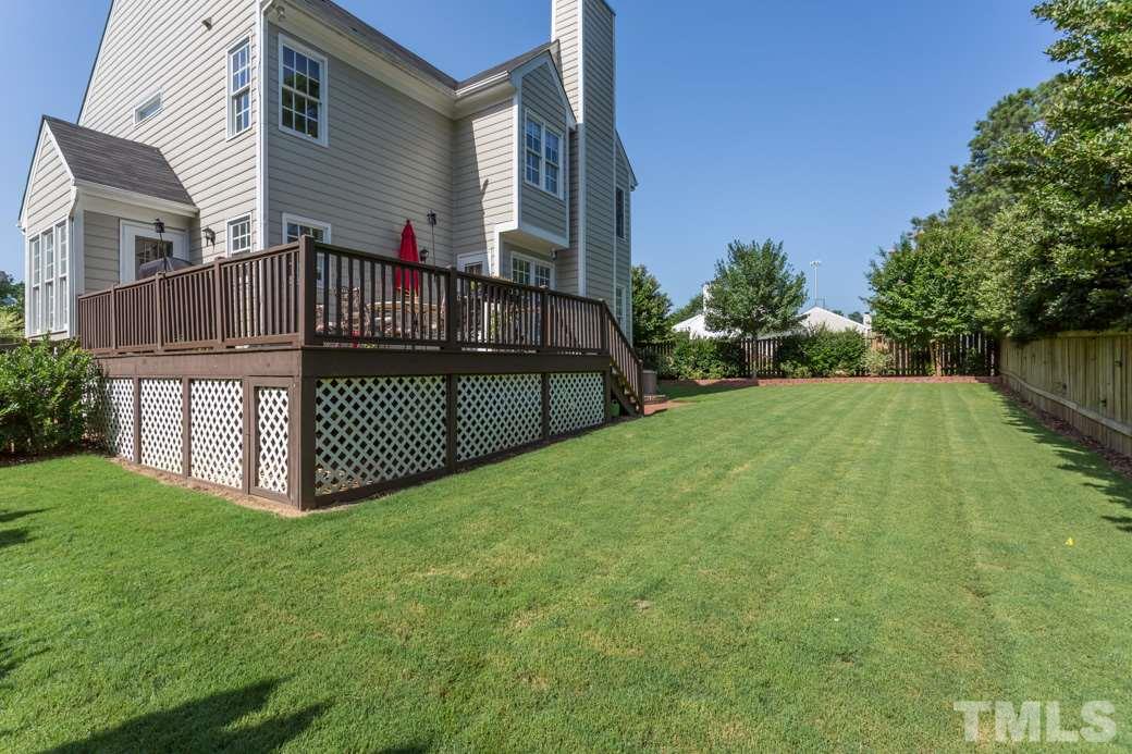 9232 Dawnshire Road Raleigh, NC 27615 - Photo 9 of 9 a view of a porch with a yard