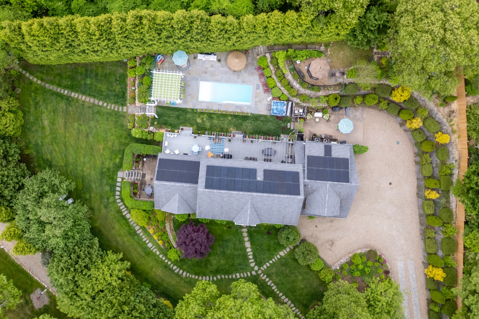 8 Fresh Pond Road Oak Bluffs, MA 02557 - Photo 36 of 36 an aerial view of a house with a swimming pool