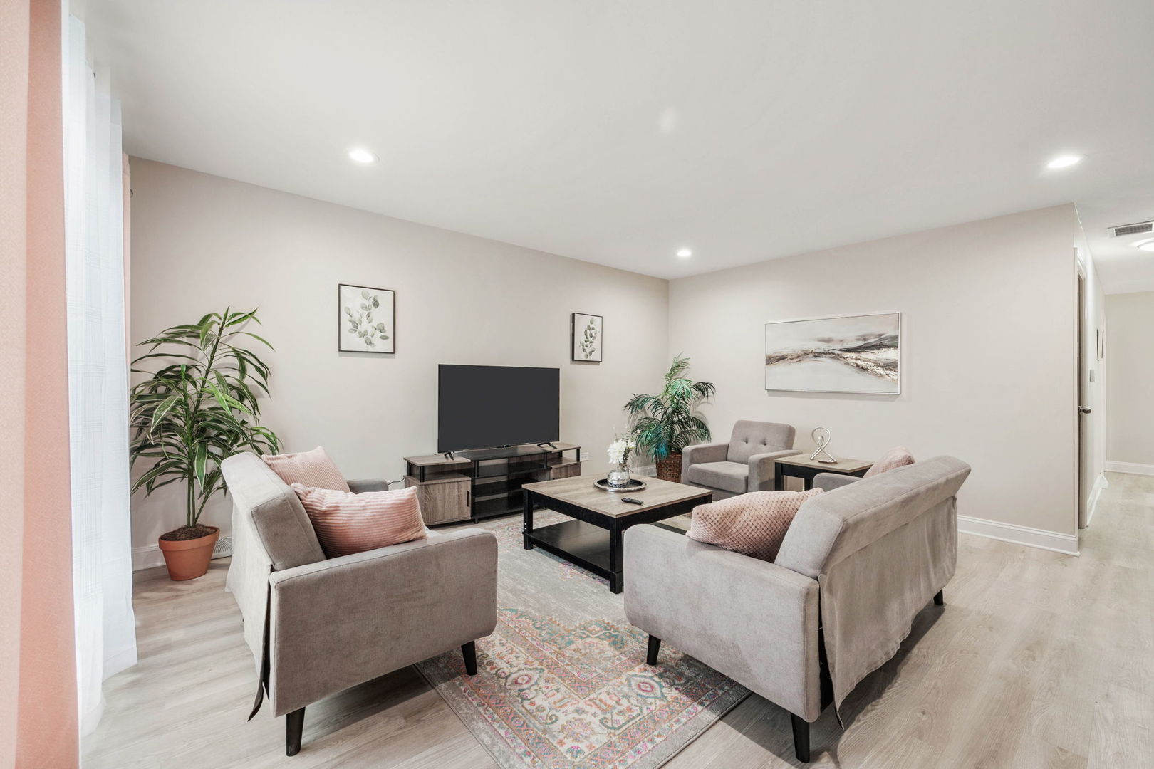 10907 South Normandy Avenue Worth, IL 60482 - Photo 2 of 29 a living room with furniture and a flat screen tv