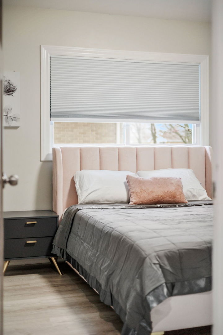 10907 South Normandy Avenue Worth, IL 60482 - Photo 22 of 29 a bedroom with a bed and a window