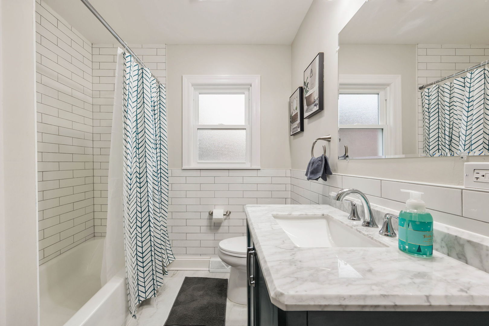 10907 South Normandy Avenue Worth, IL 60482 - Photo 26 of 29 a bathroom with a granite countertop sink a toilet and shower