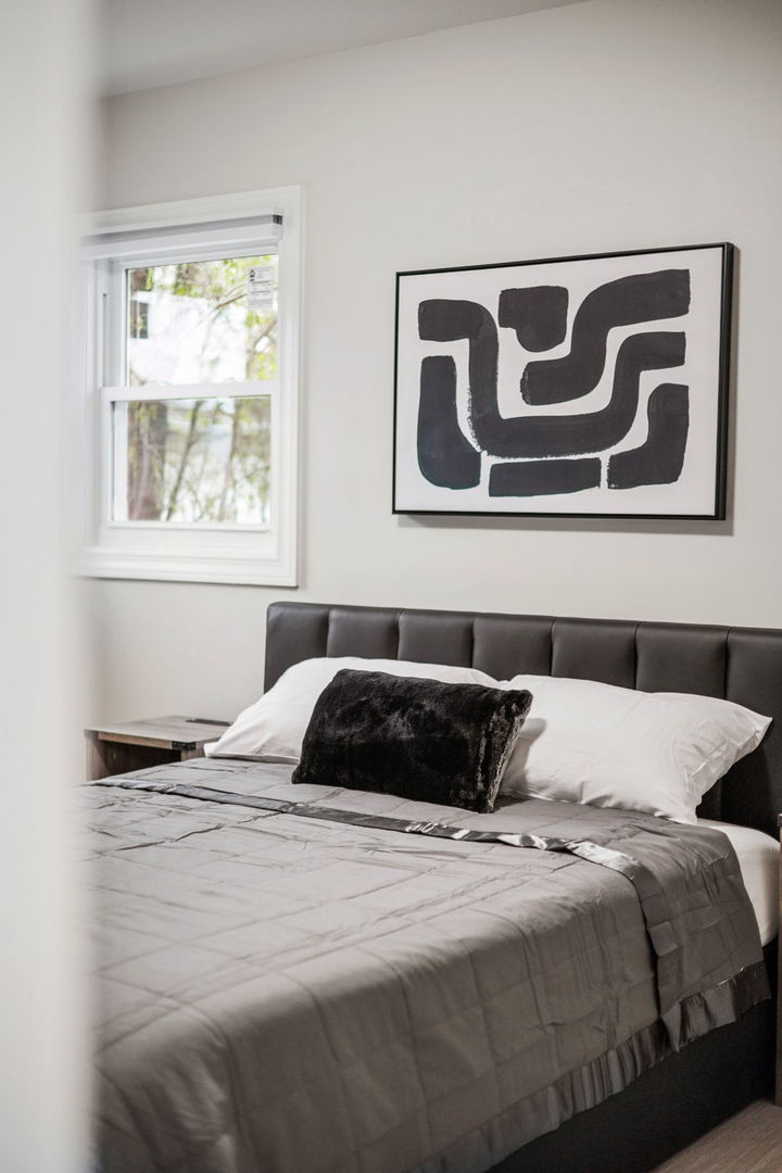 10907 South Normandy Avenue Worth, IL 60482 - Photo 28 of 29 a bedroom with a bed and a window