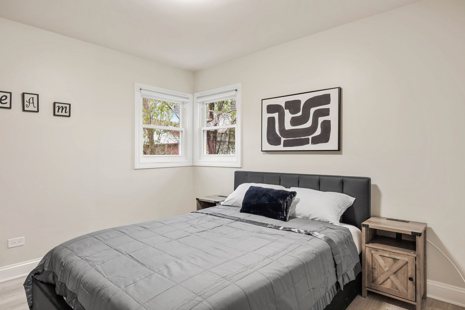 10907 South Normandy Avenue Worth, IL 60482 - Photo 29 of 29 a bedroom with a bed and a window