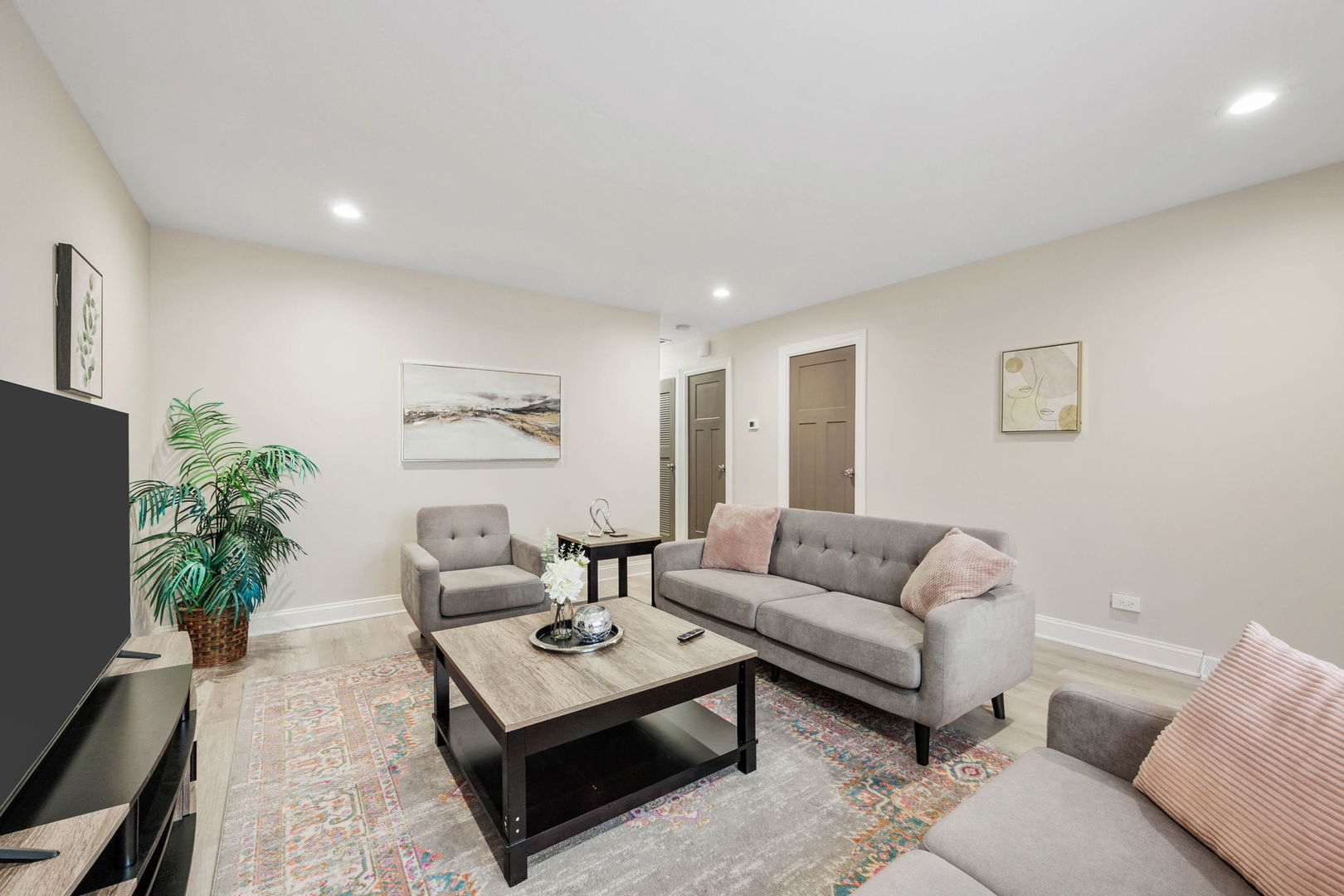 10907 South Normandy Avenue Worth, IL 60482 - Photo 3 of 29 a living room with furniture potted plant and a window