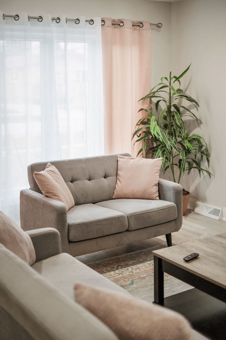 10907 South Normandy Avenue Worth, IL 60482 - Photo 4 of 29 a living room with furniture and a potted plant