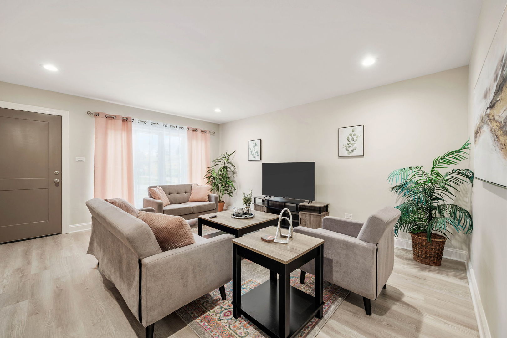 10907 South Normandy Avenue Worth, IL 60482 - Photo 7 of 29 a living room with furniture potted plant and a window