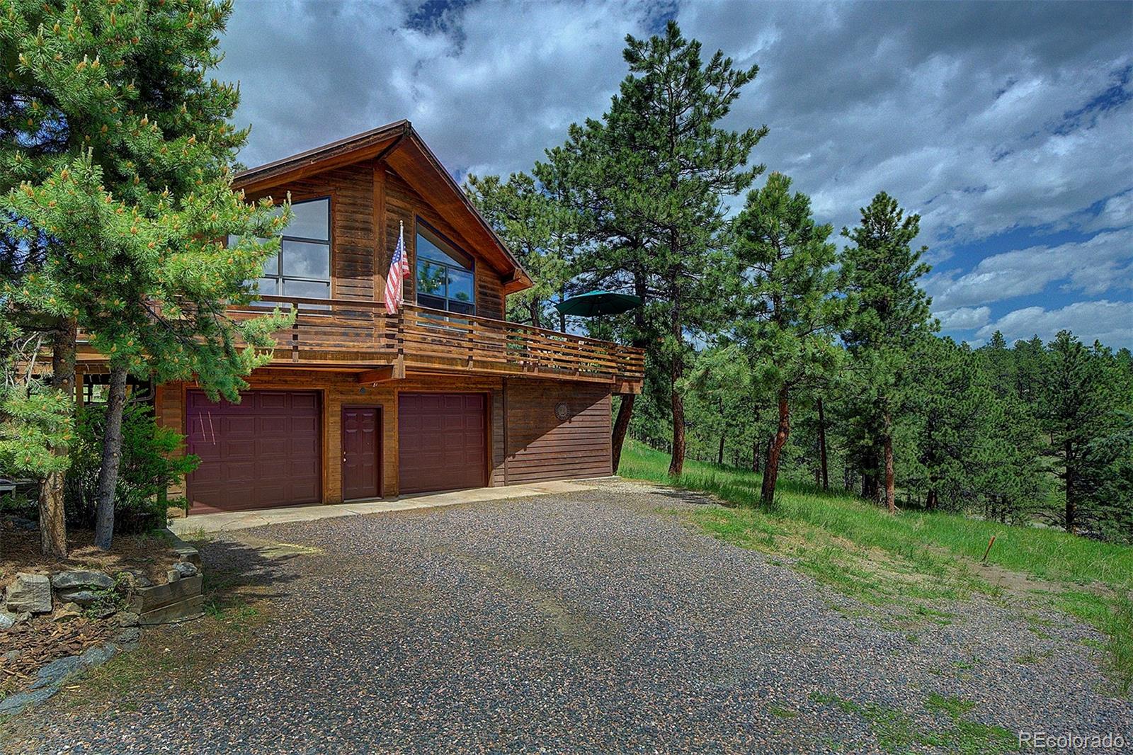 a front view of a house with a garage