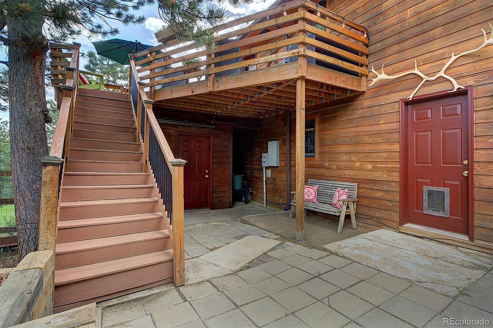 29659 Spruce Road Evergreen, CO 80439 - Photo 34 of 38 a view of outdoor seating space