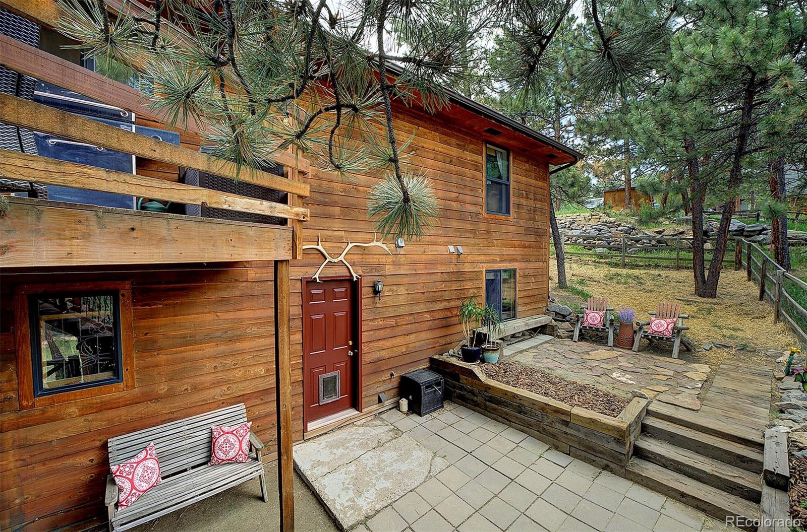 29659 Spruce Road Evergreen, CO 80439 - Photo 35 of 38 a view of a two chairs in the street