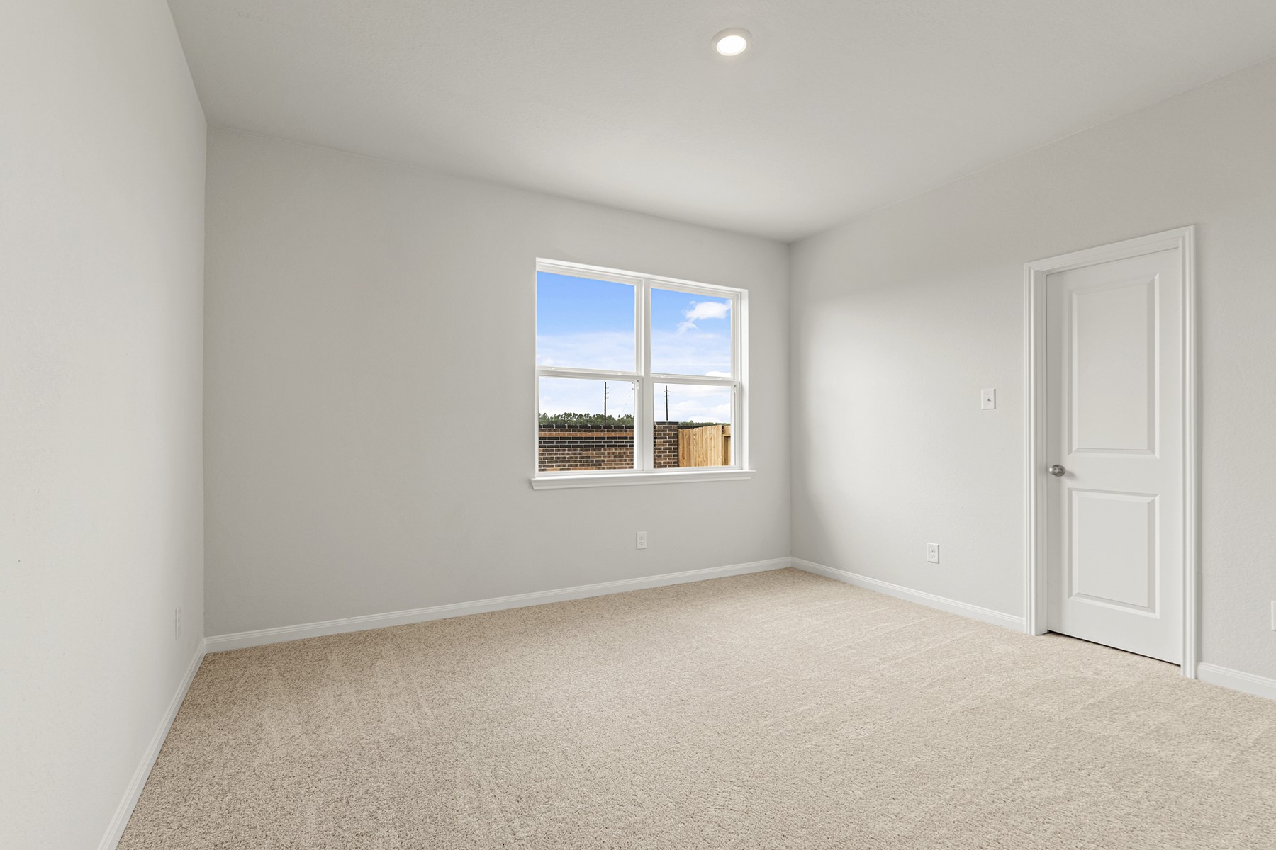 8830 Ice Quartz Drive Iowa Colony, TX 77583 - Photo 11 of 18 an empty room with windows