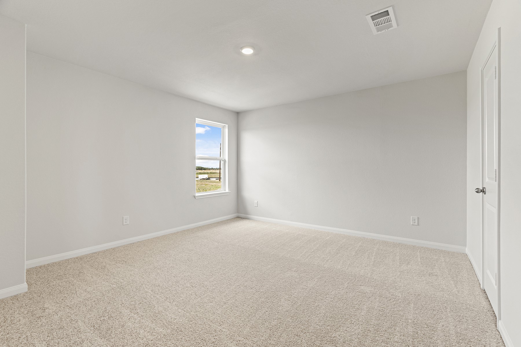 8830 Ice Quartz Drive Iowa Colony, TX 77583 - Photo 9 of 18 a view of an empty room with a window