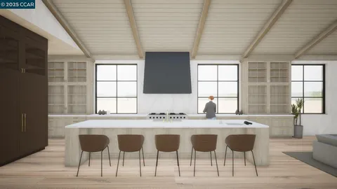 a view of a dining room with furniture and window