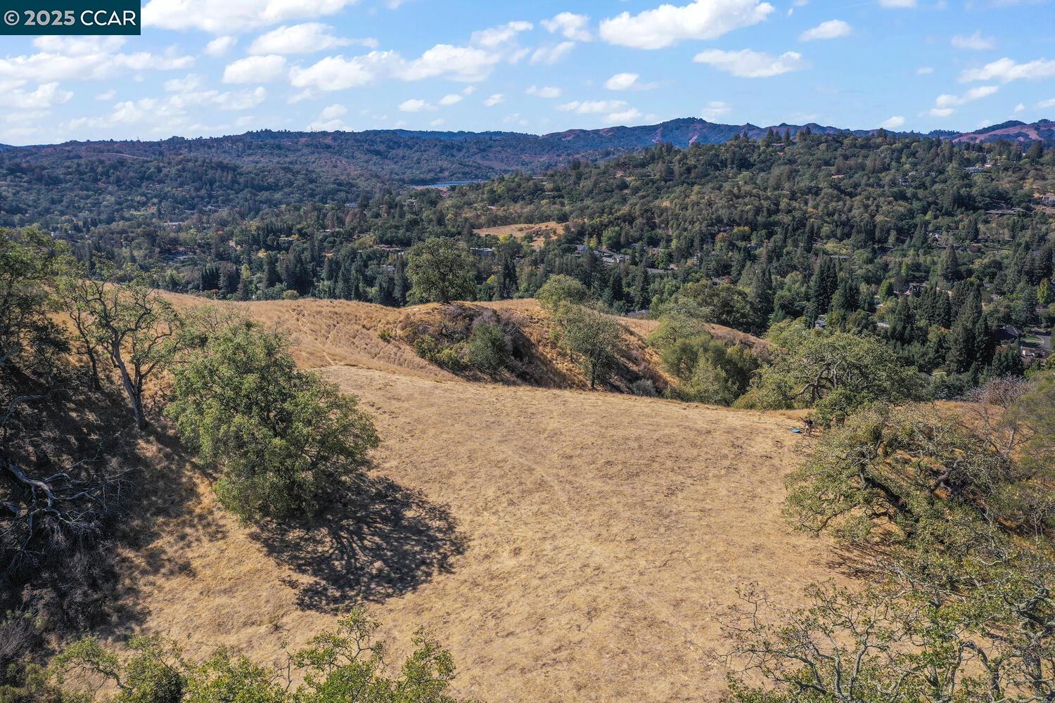 1240 Monticello Road Lafayette, CA 94549 - Photo 26 of 38 a view of a dry yard with mountains