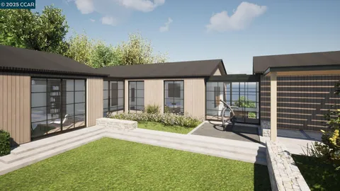 a front view of house with yard and seating area