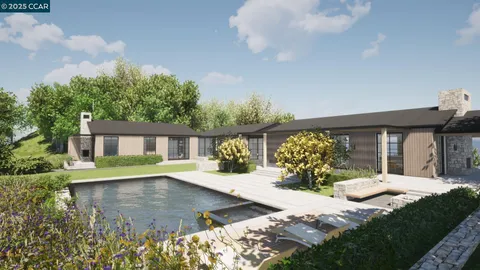 a view of a house with yard and sitting area