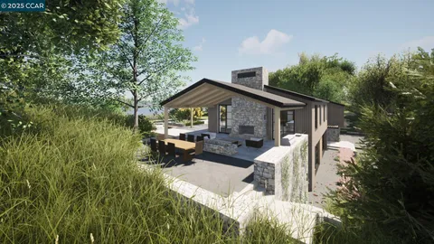 a view of a house with backyard and sitting area