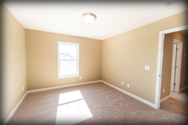 1036 Rudder Drive Spring Hill, TN 37174 - Photo 10 of 15 Stock photo of a completed home in a different color pallet.