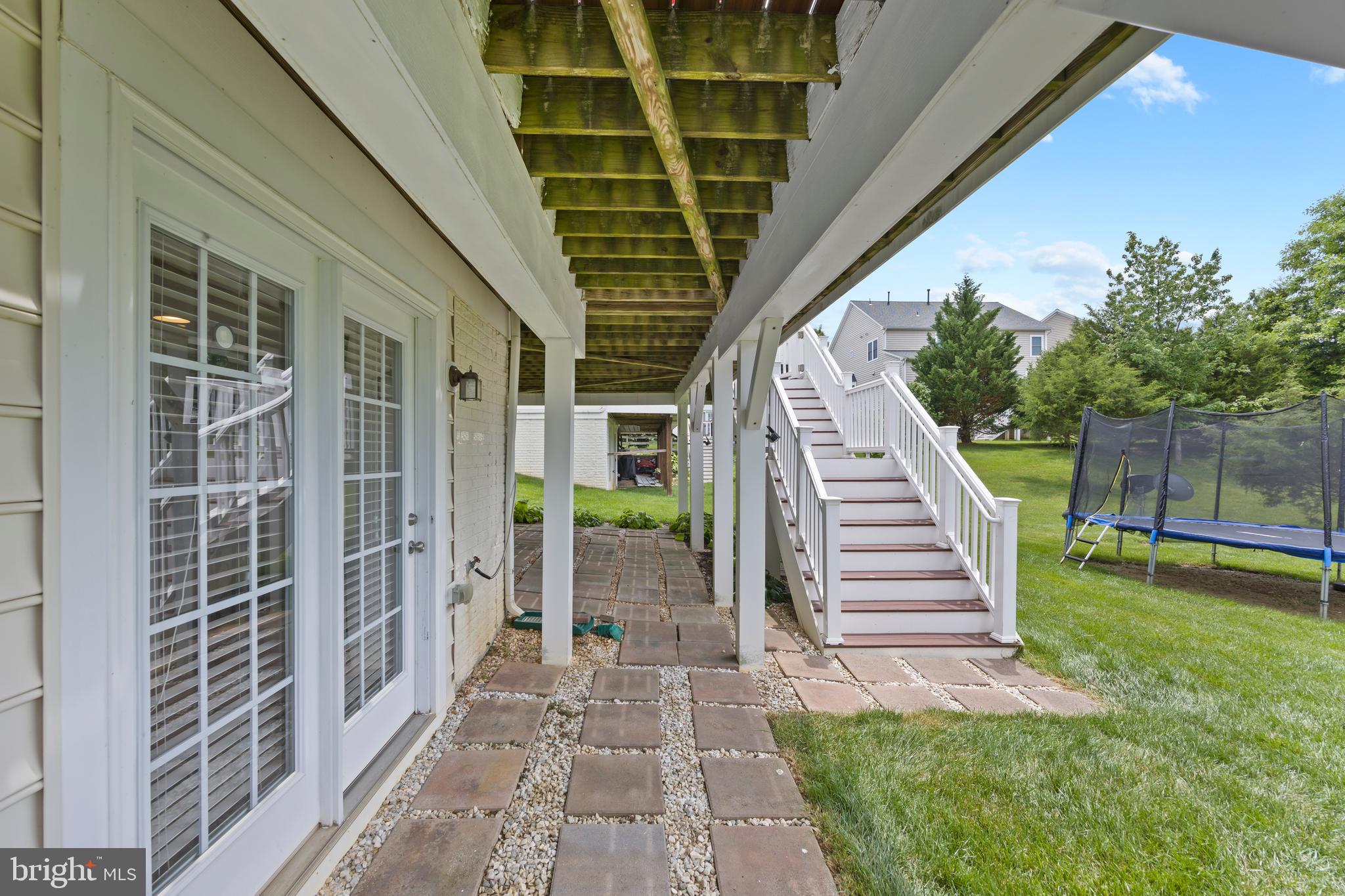 9175 Bealls Farm Road Frederick, MD 21704 - Photo 44 of 53 Walkout from Lower Level + Stairs from Upper Deck
