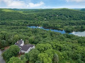 28 Ridge Way Purdys, NY 10578 - Photo 1 of 1 an aerial view of residential houses with outdoor space and trees