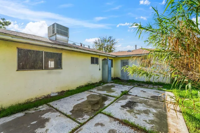 a view of a house with a patio