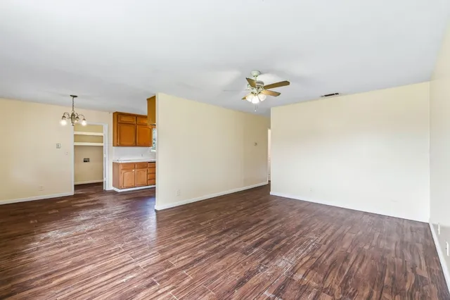 a view of a livingroom with wooden floor