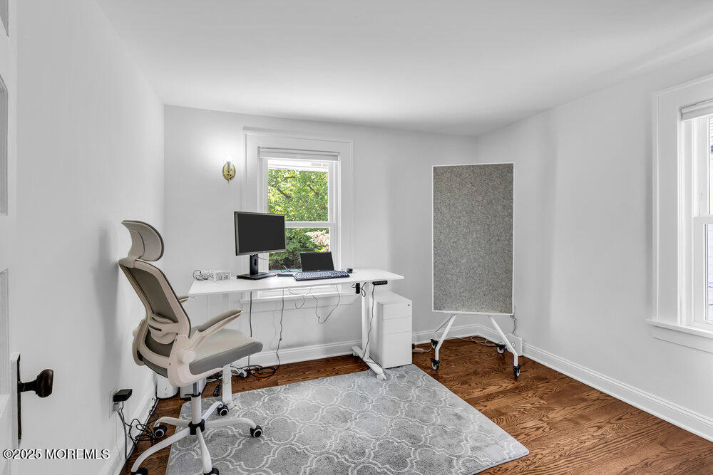 208 East Bergen Place Red Bank, NJ 07701 - Photo 14 of 25 a workspace with furniture and window