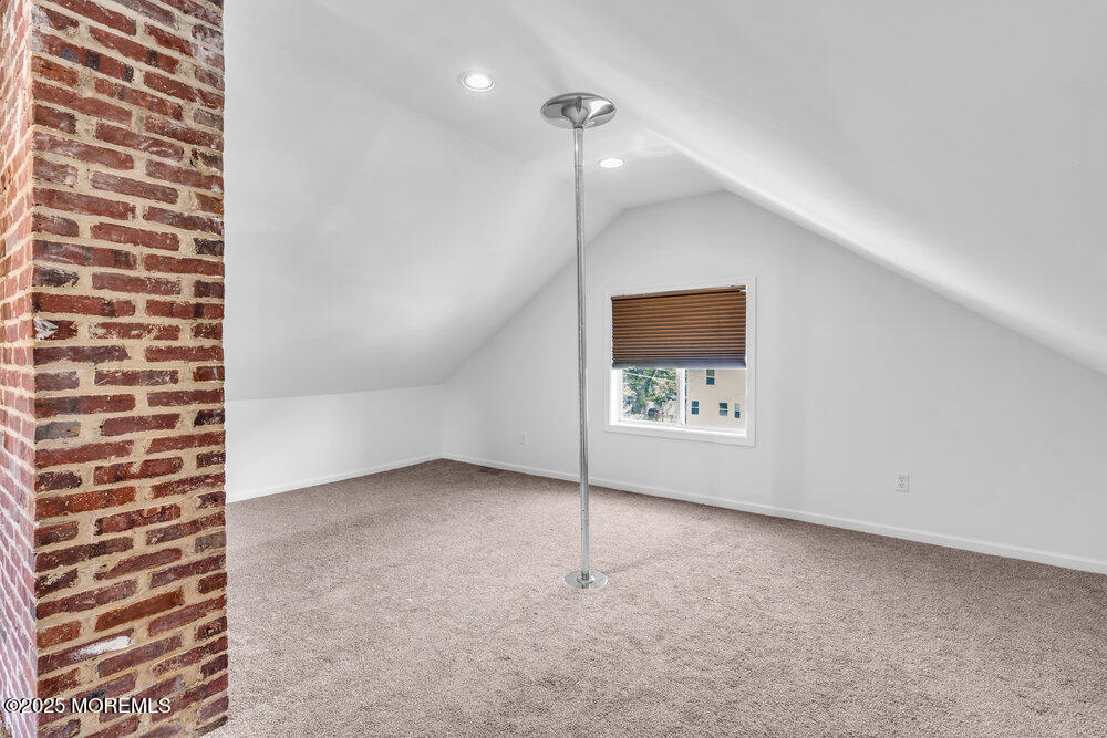 208 East Bergen Place Red Bank, NJ 07701 - Photo 16 of 25 a view of an empty room with a window