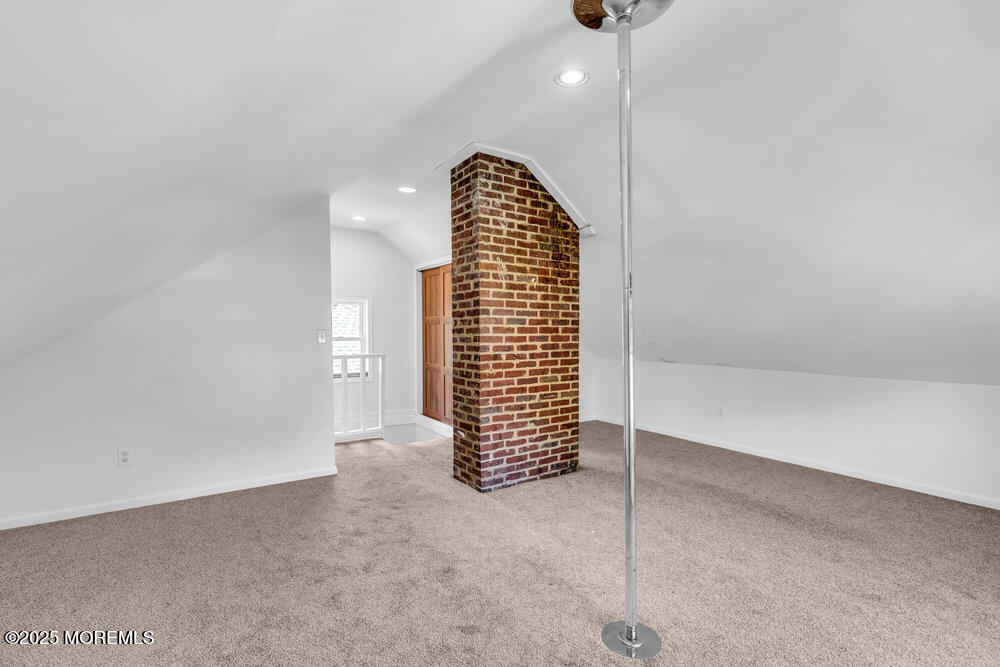 208 East Bergen Place Red Bank, NJ 07701 - Photo 17 of 25 a view of empty room with staircase