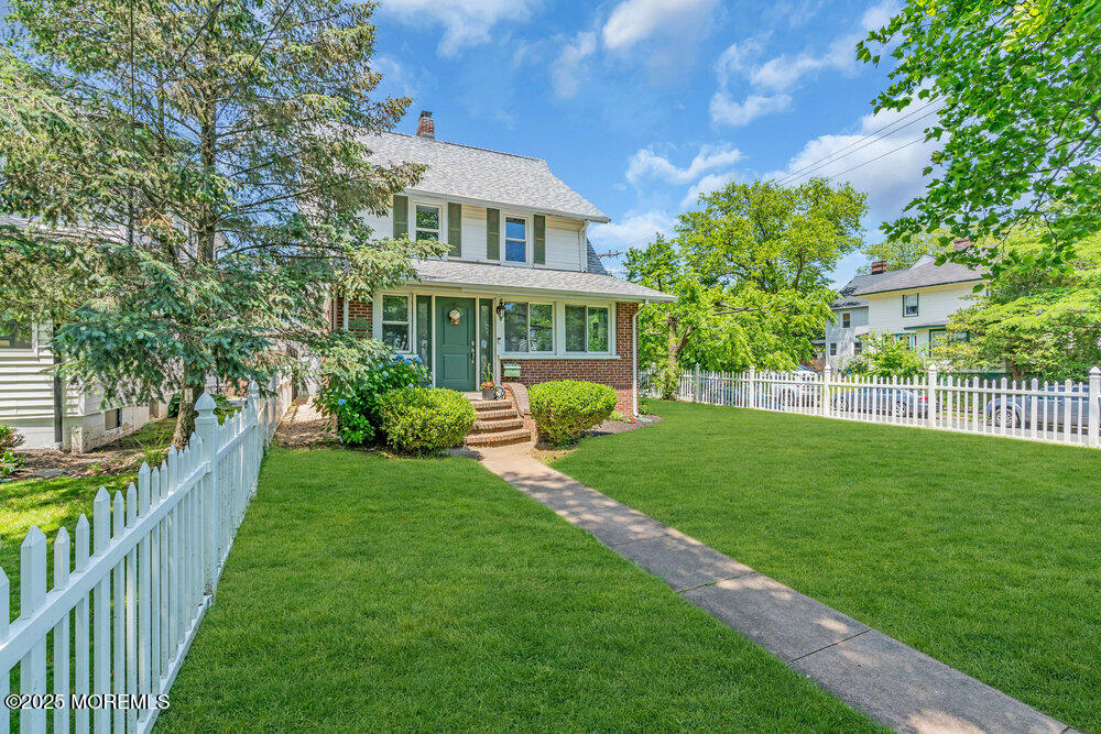 208 East Bergen Place Red Bank, NJ 07701 - Photo 22 of 25 a view of a house with backyard and porch