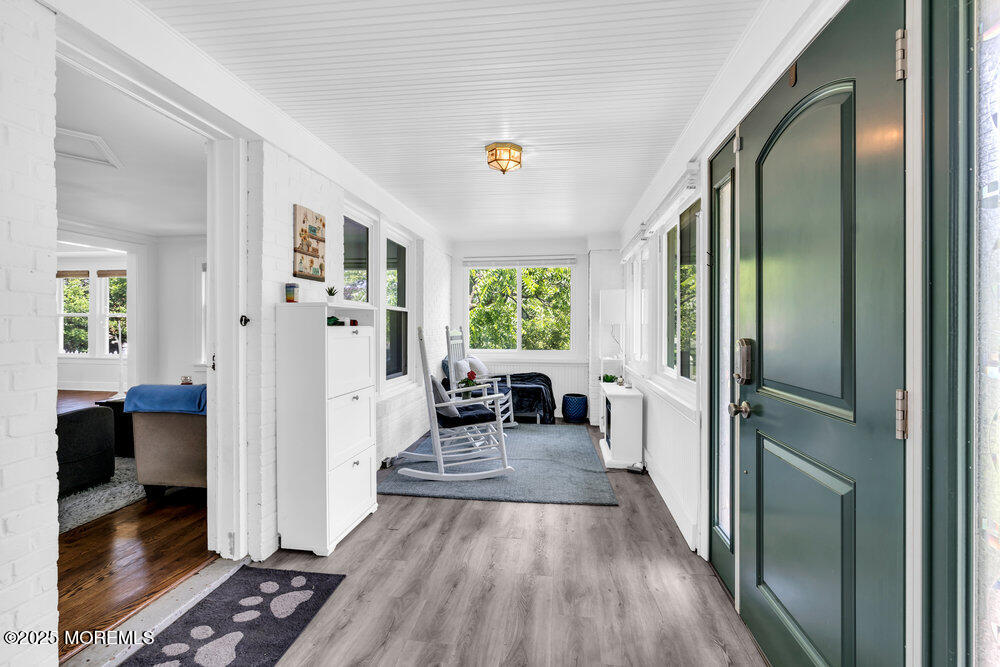 208 East Bergen Place Red Bank, NJ 07701 - Photo 3 of 25 a view of livingroom with furniture and wooden floor