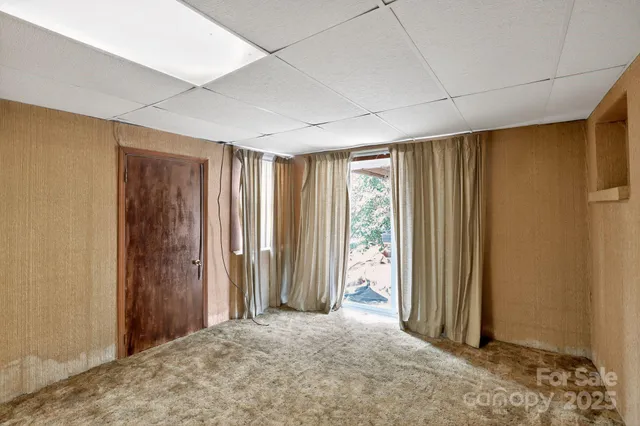 a view of an empty room with window