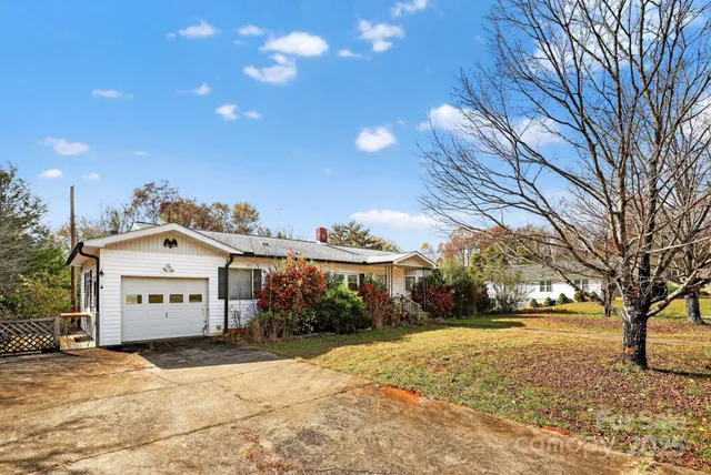 a large building with a large tree in front of it