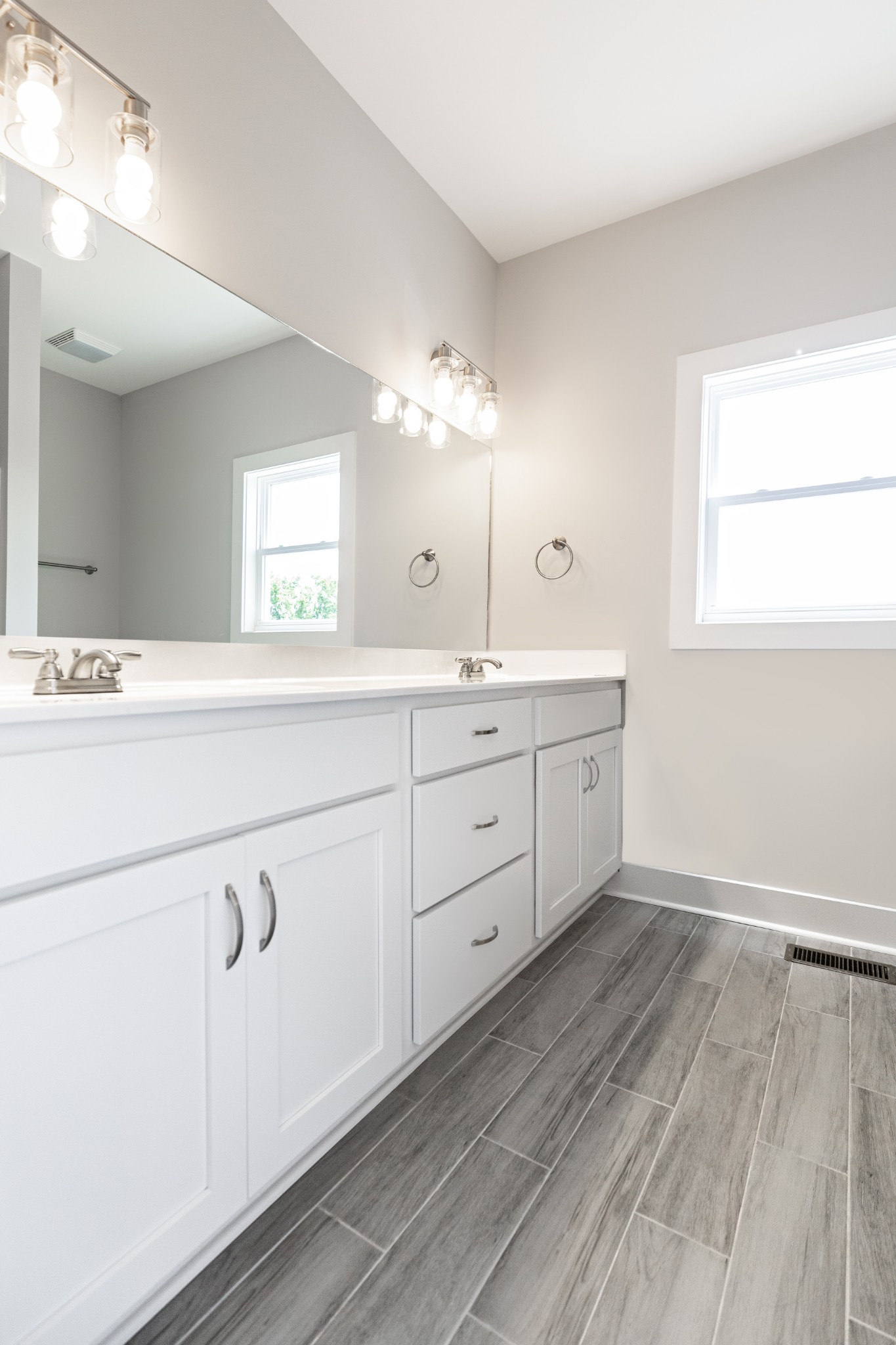 246 Woodruff Road Adams, TN 37010 - Photo 13 of 18 a room with a sink cabinets and a window