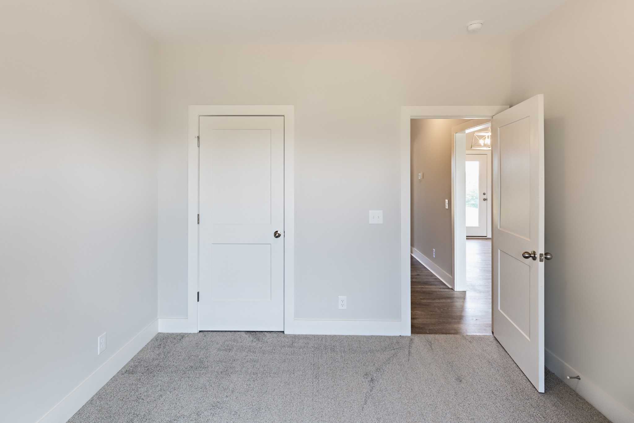 246 Woodruff Road Adams, TN 37010 - Photo 17 of 18 an empty room with closet and mirror