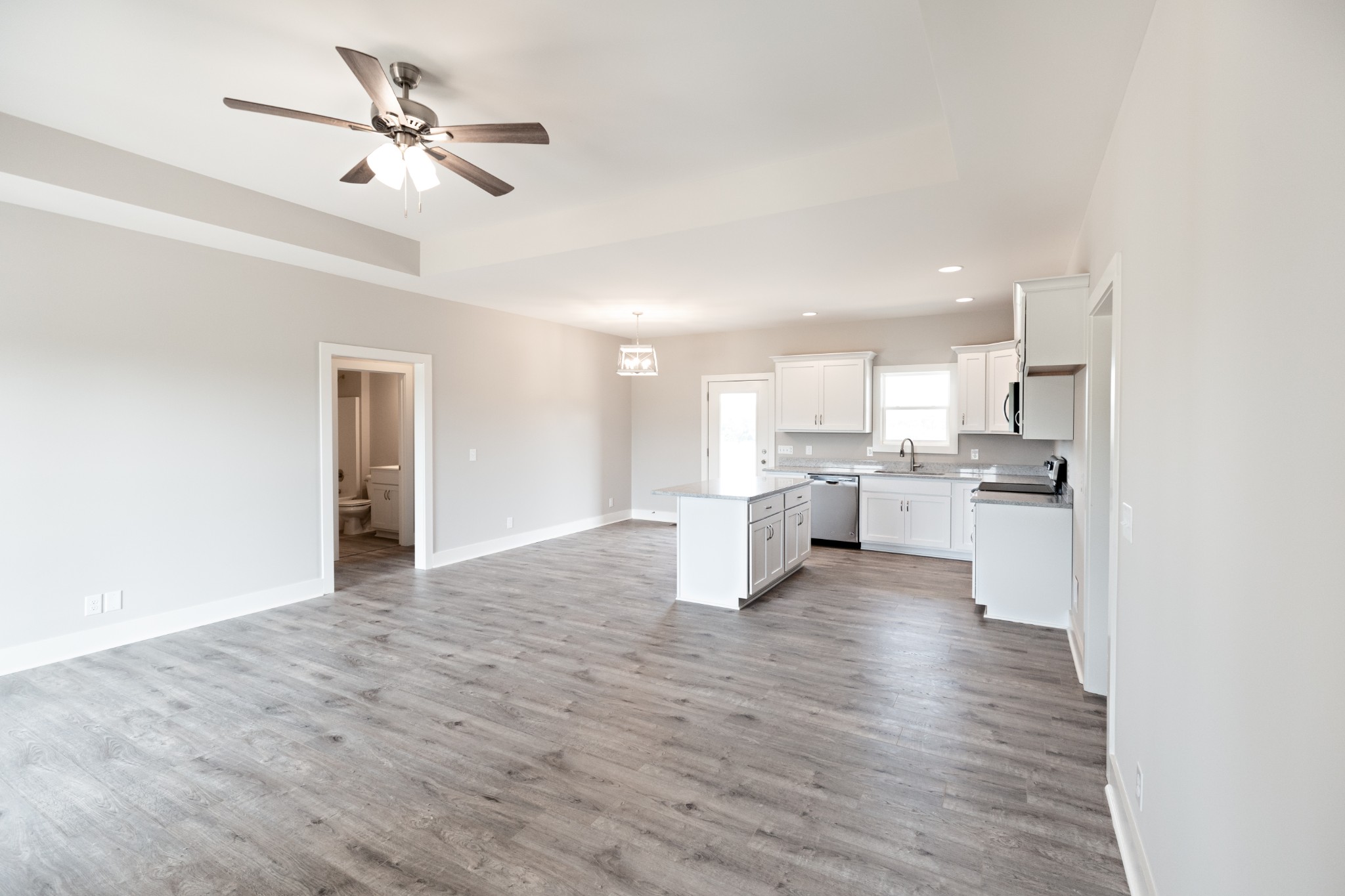 246 Woodruff Road Adams, TN 37010 - Photo 7 of 18 a view of kitchen with wooden floor