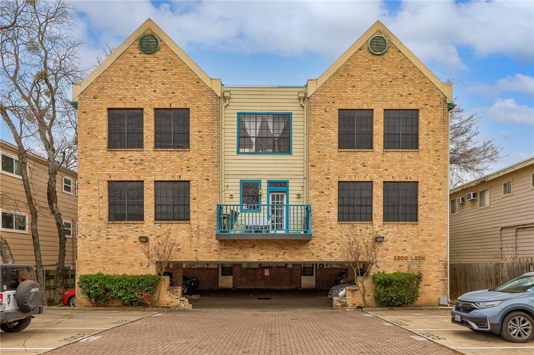 2300 Leon Street, Unit 102 Austin, TX 78705 - Photo 1 of 1 a front view of a house with parking space