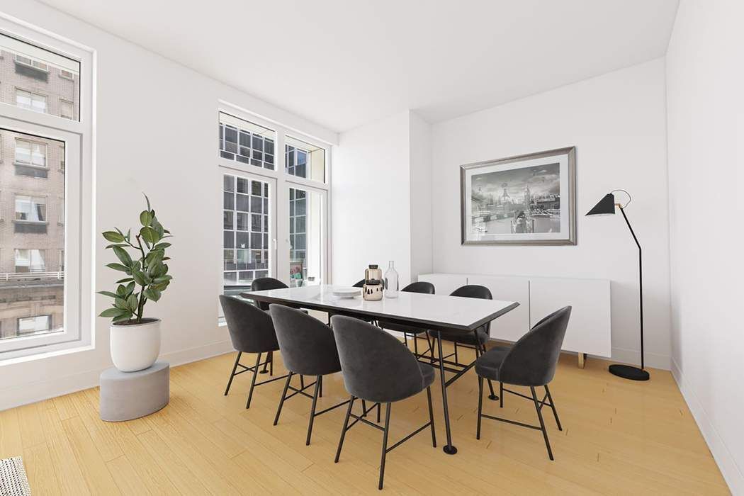 5 East 44th Street, Unit 12 Manhattan, NY 10017 - Photo 3 of 11 a view of a dining room with furniture and window