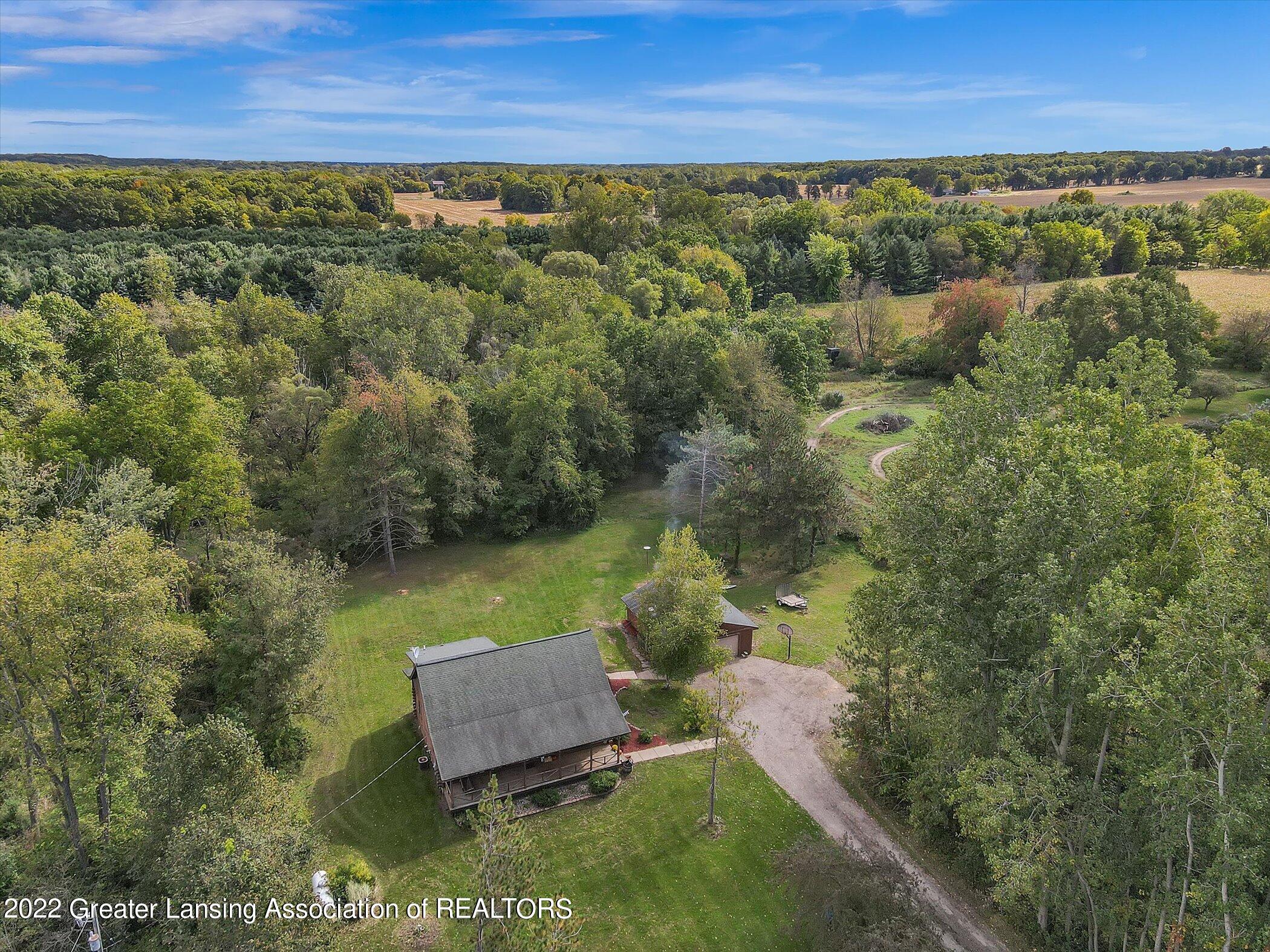 11821 Monroe Road Portland, MI 48875 - Photo 55 of 66 55-11821-Monroe-Rd-WindowStill-Real-Esta
