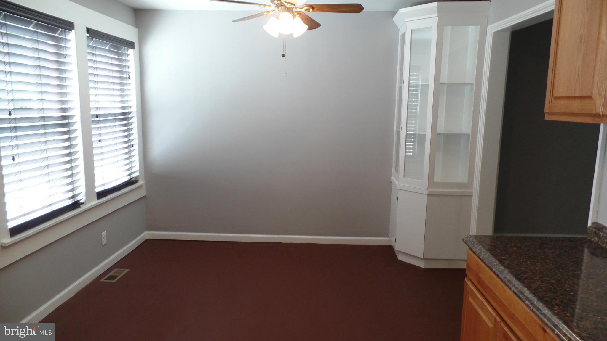 34 Portship Road Baltimore, MD 21222 - Photo 12 of 28 a room with a window and a ceiling fan