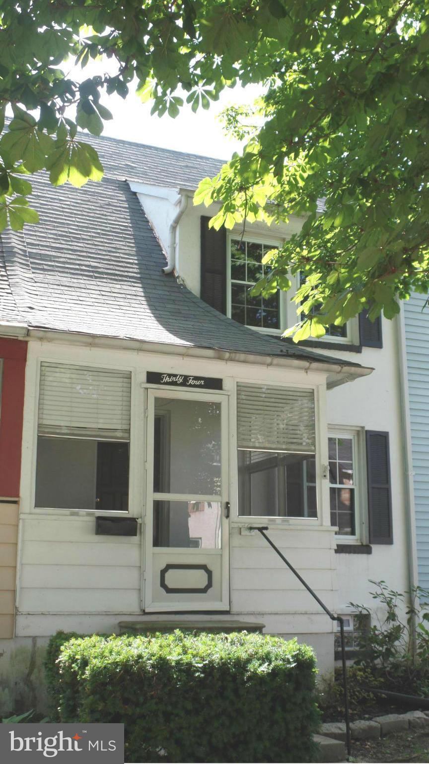 34 Portship Road Baltimore, MD 21222 - Photo 3 of 28 a front view of a house with garden