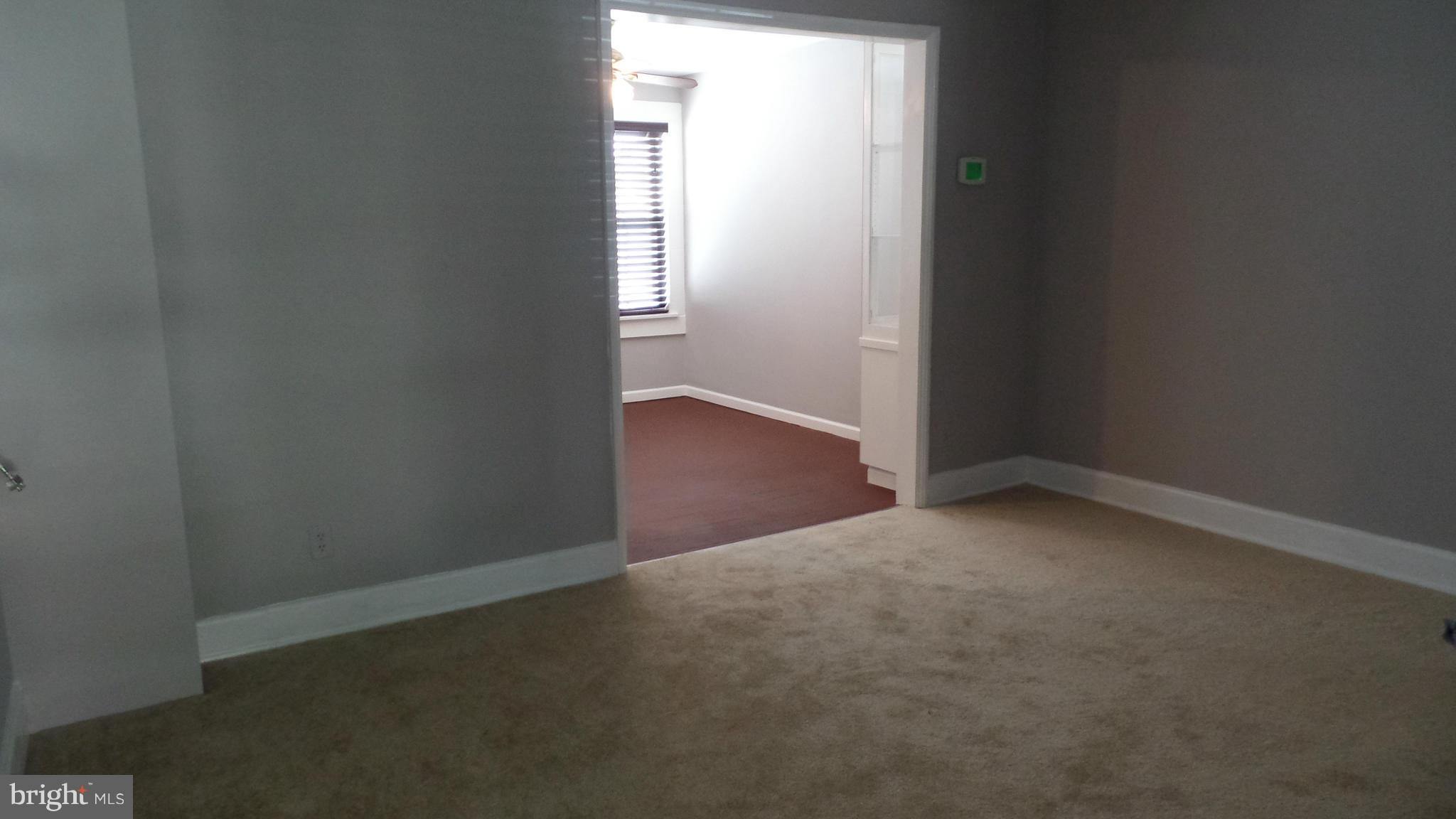 34 Portship Road Baltimore, MD 21222 - Photo 6 of 28 an empty room that has a window