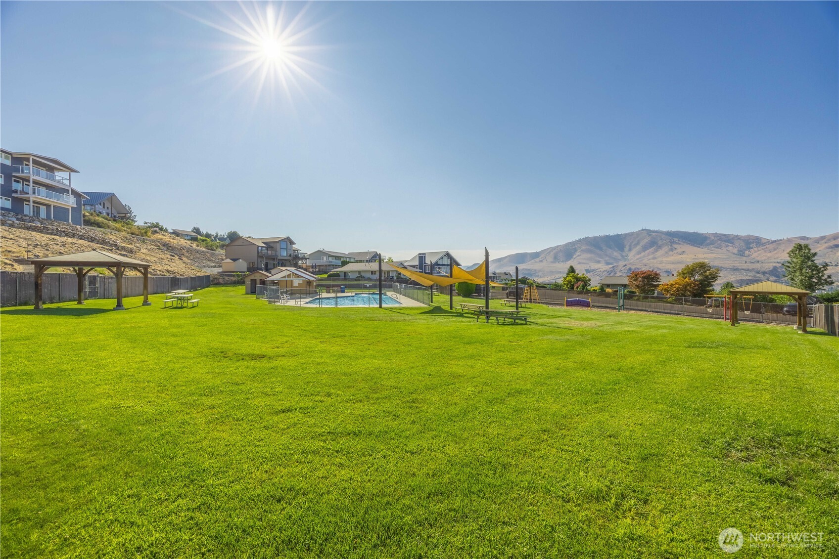 122 Lookout Way Chelan, WA 98816 - Photo 40 of 40 a view of green field with house in the background