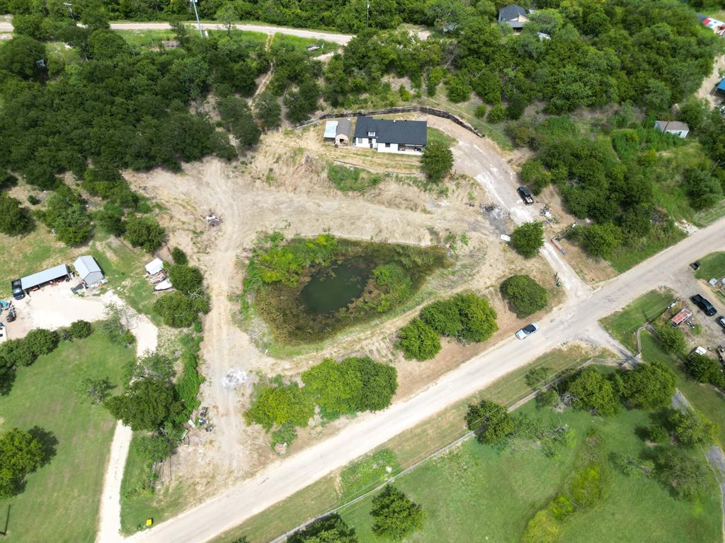 441 Mesa Road Waxahachie, TX 75167 - Photo 2 of 11 a view of a lake with a yard