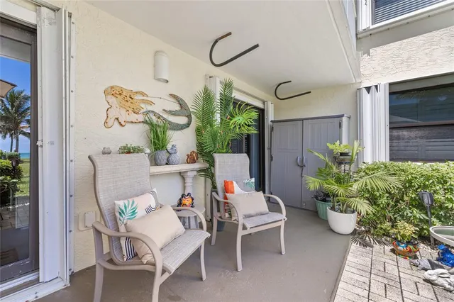 a view of a balcony with an ocean