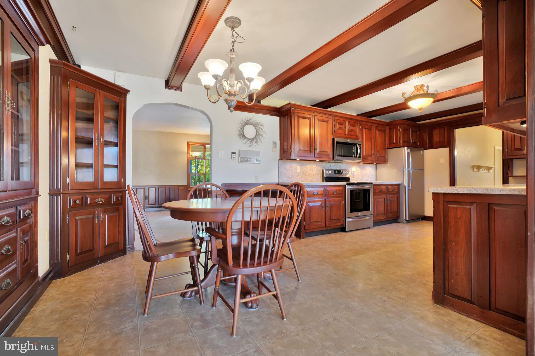 1009 River Road Quarryville, PA 17566 - Photo 14 of 39 Dining area with cherry built-ins