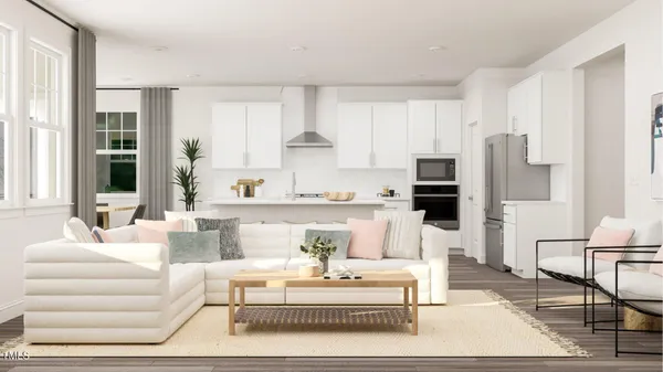 a bathroom with cabinets a sink and a mirror