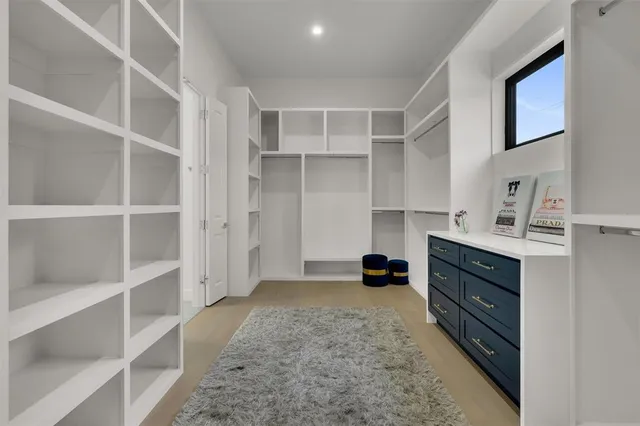 a kitchen with a cabinets and window